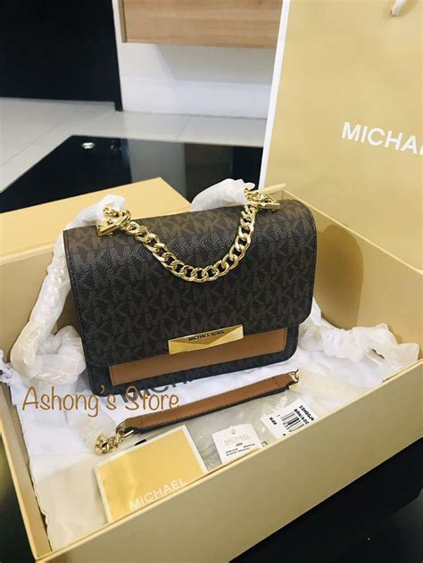 michael kors jet set original vs fake - Michael Kors bag lookup.